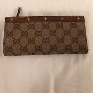 Gucci wallet with gold studs