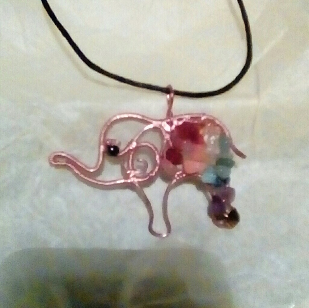 Copper elephant with chakra stones