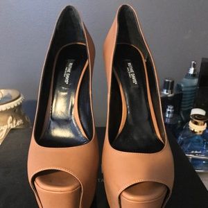 Tan platform pumps worn twice