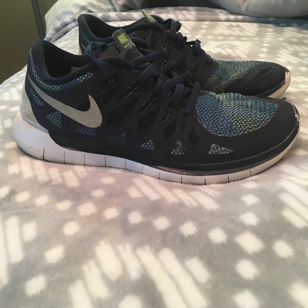 Navy blue Nike frees