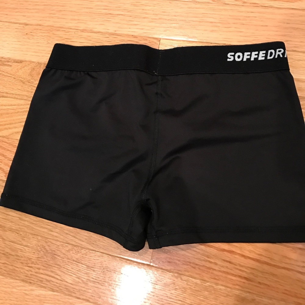 Black athletic Soffe shorts.