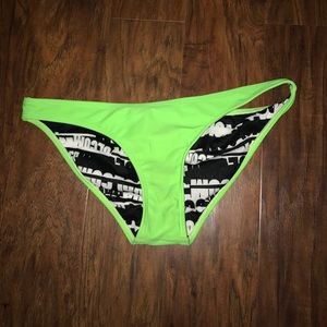 Reversible neon green bikini bottoms