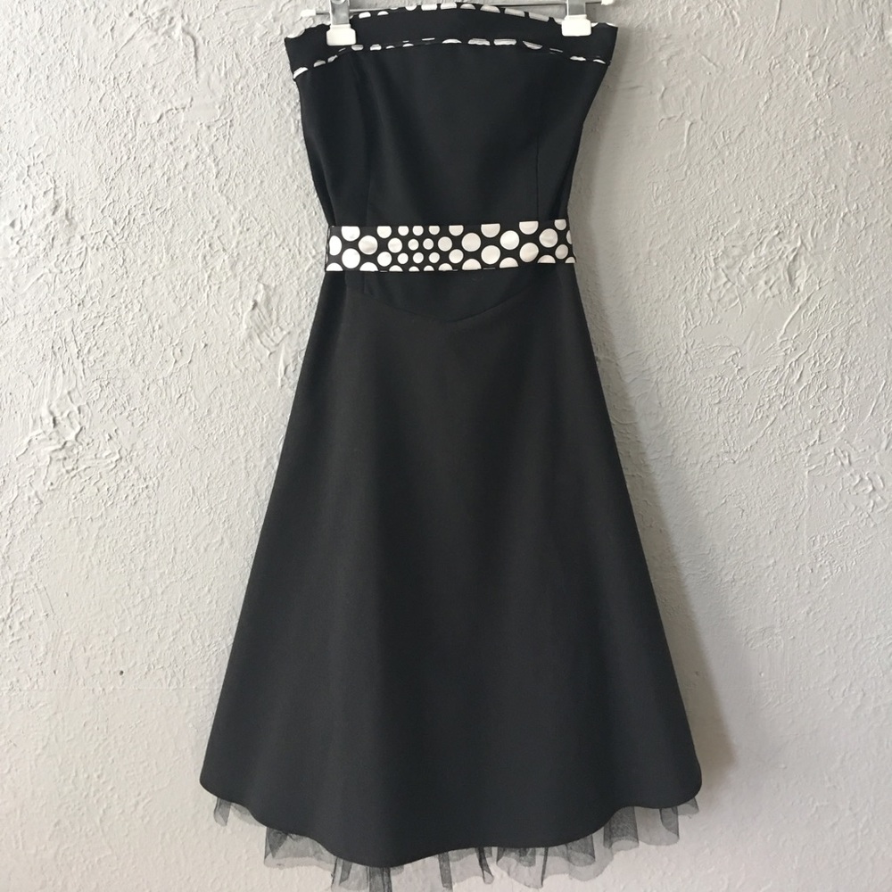 Little black dress with white polkadot detail