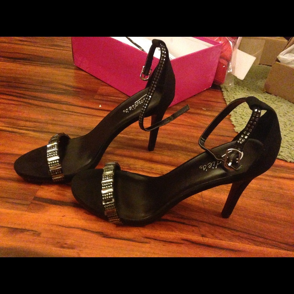 Brand new, candies black heels 8.5