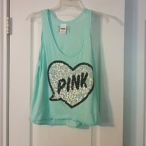 A  light blue small PINK tank top