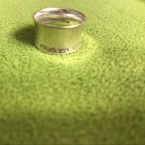 Classic, wide band Tiffany & Co. Ring