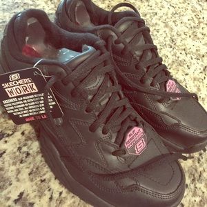 Black slip resistant Skechers, never worn