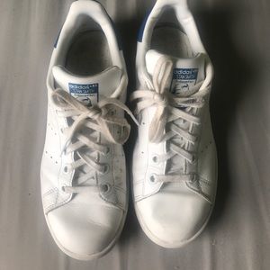 Blue and white adidas Stan smiths