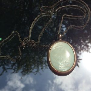 Gold necklace with white opal pendant