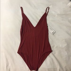 New chestnut low back &a deep v bodysuit