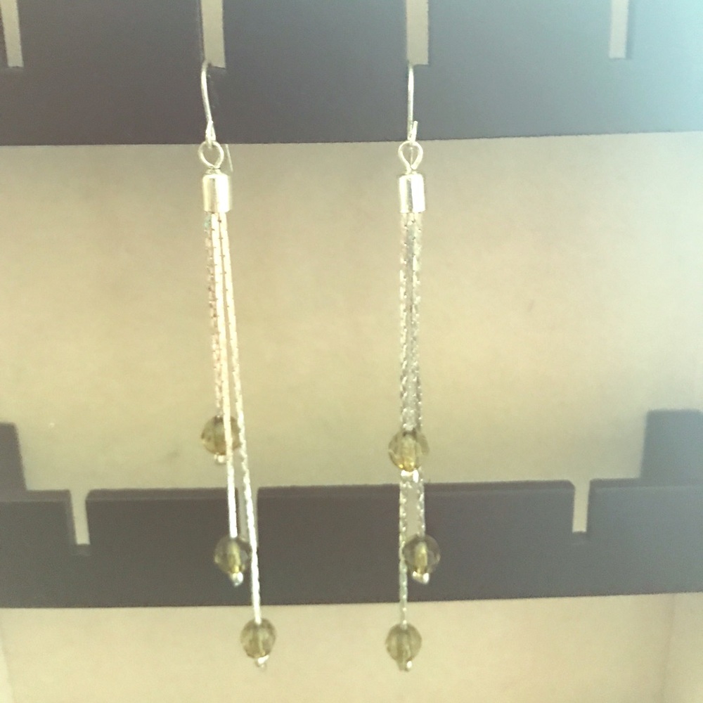 Silver earrings with green beads