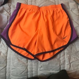 neon orange kids Nike shorts