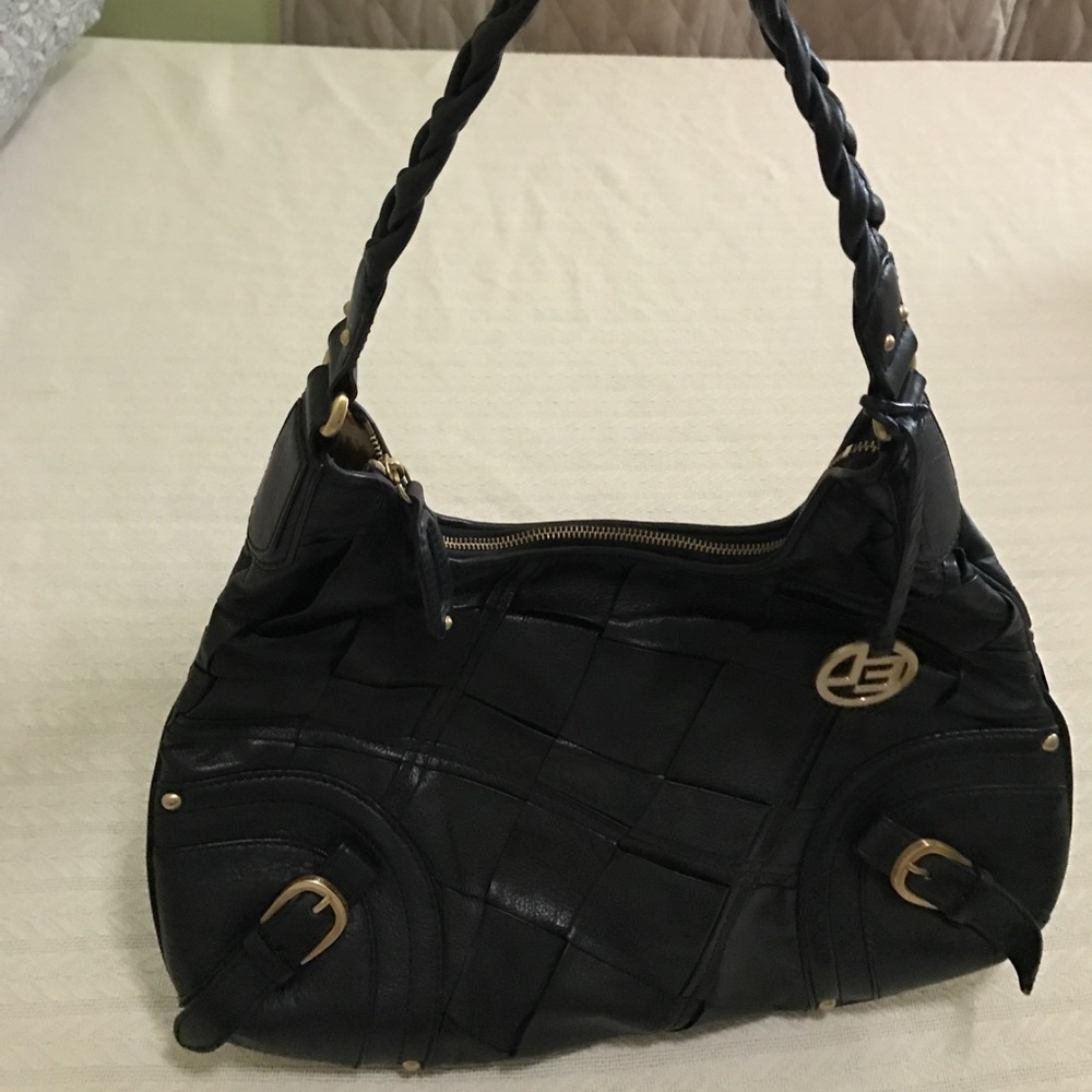 Black leather purse. Only used a couple times.