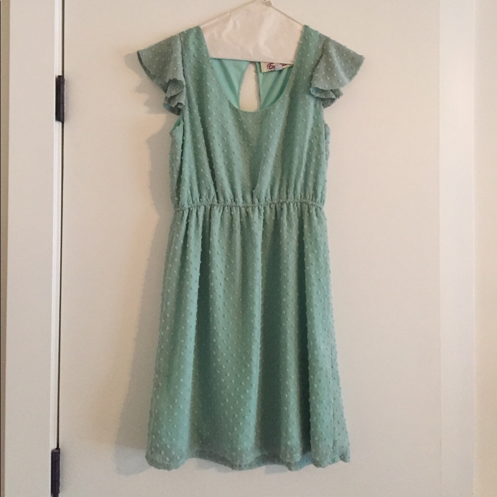 Francesca's green dress