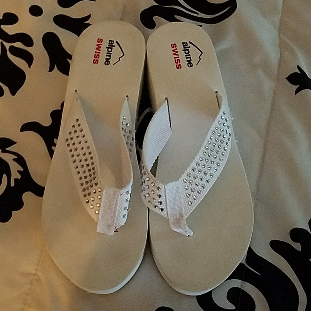 White rhinestone flip flops