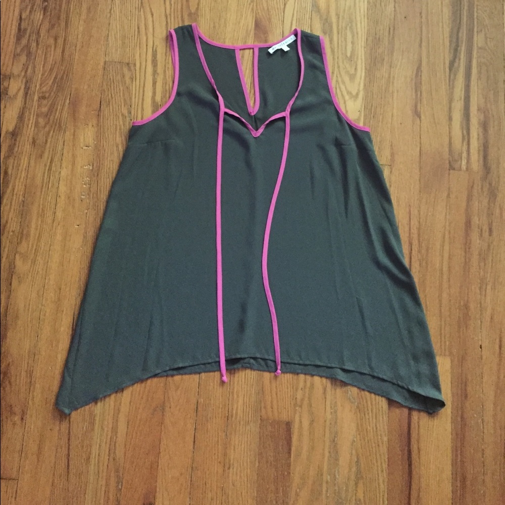 Green sleeveless top with pink trim