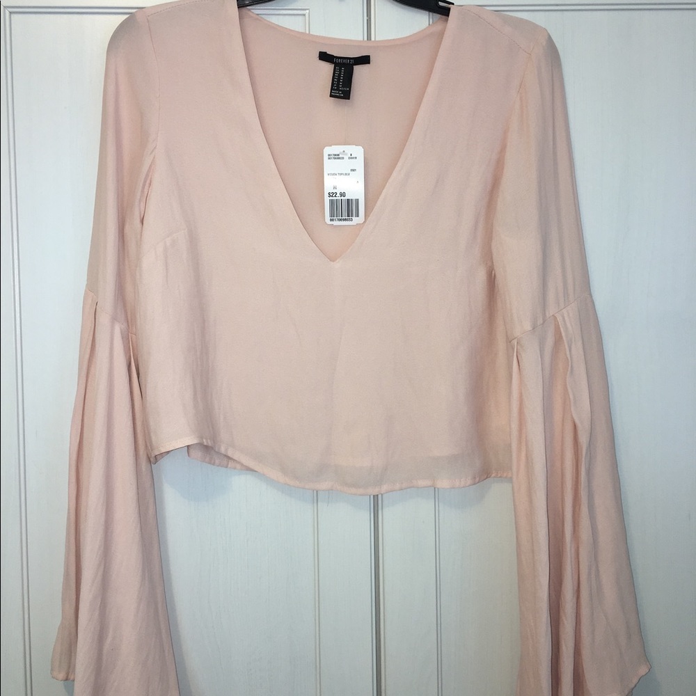 Baby pink bell sleeve top