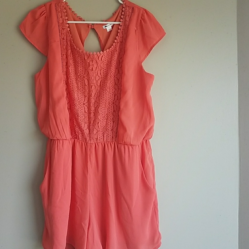 Orange romper with lace detail!