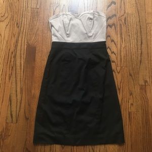 Cream and black cocktail dress.