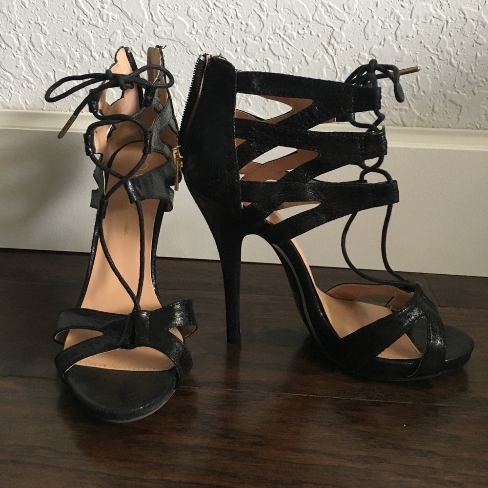 Never worn lace up heels.