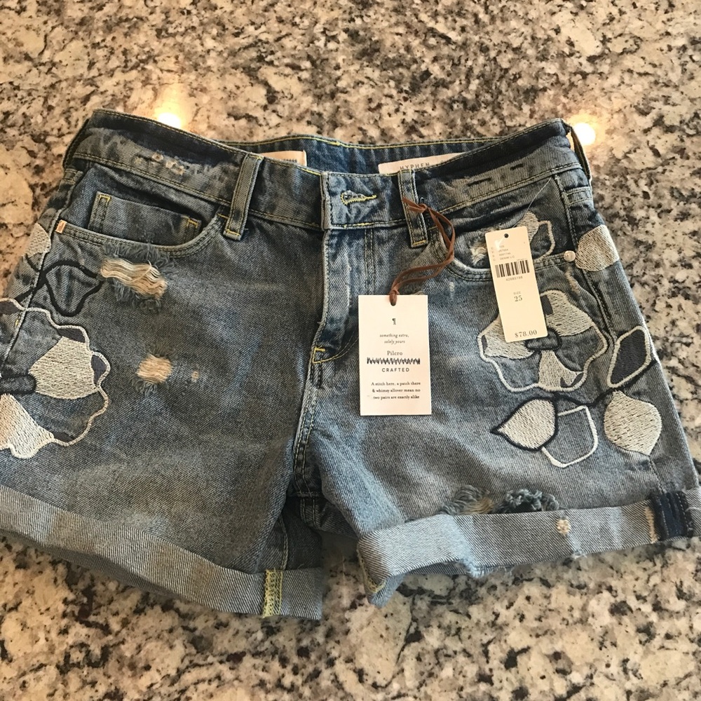 Floral anthropology denim shorts