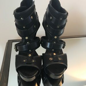 Black leather and gold wedge sandals