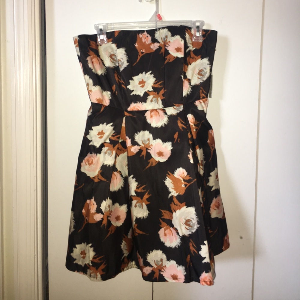 Fit and flare mini strapless mini dress.