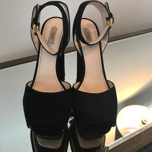 Black suede Prada heels