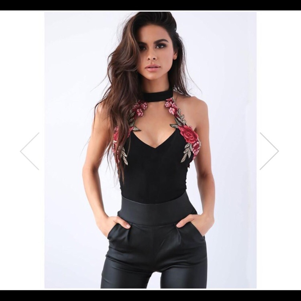 Brand new floral body suit