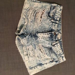 Distressed high waisted denim shorts.
