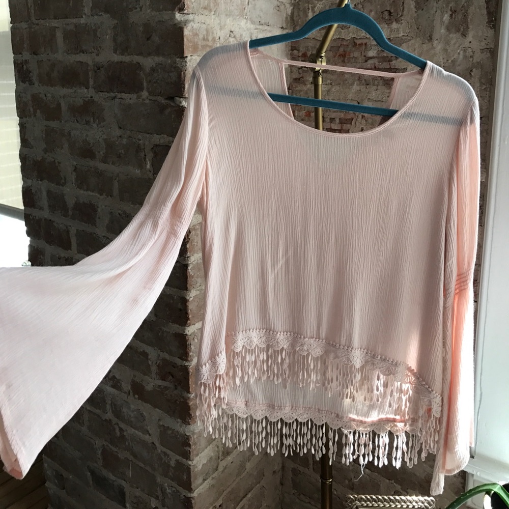Blush bell sleeve fringe top