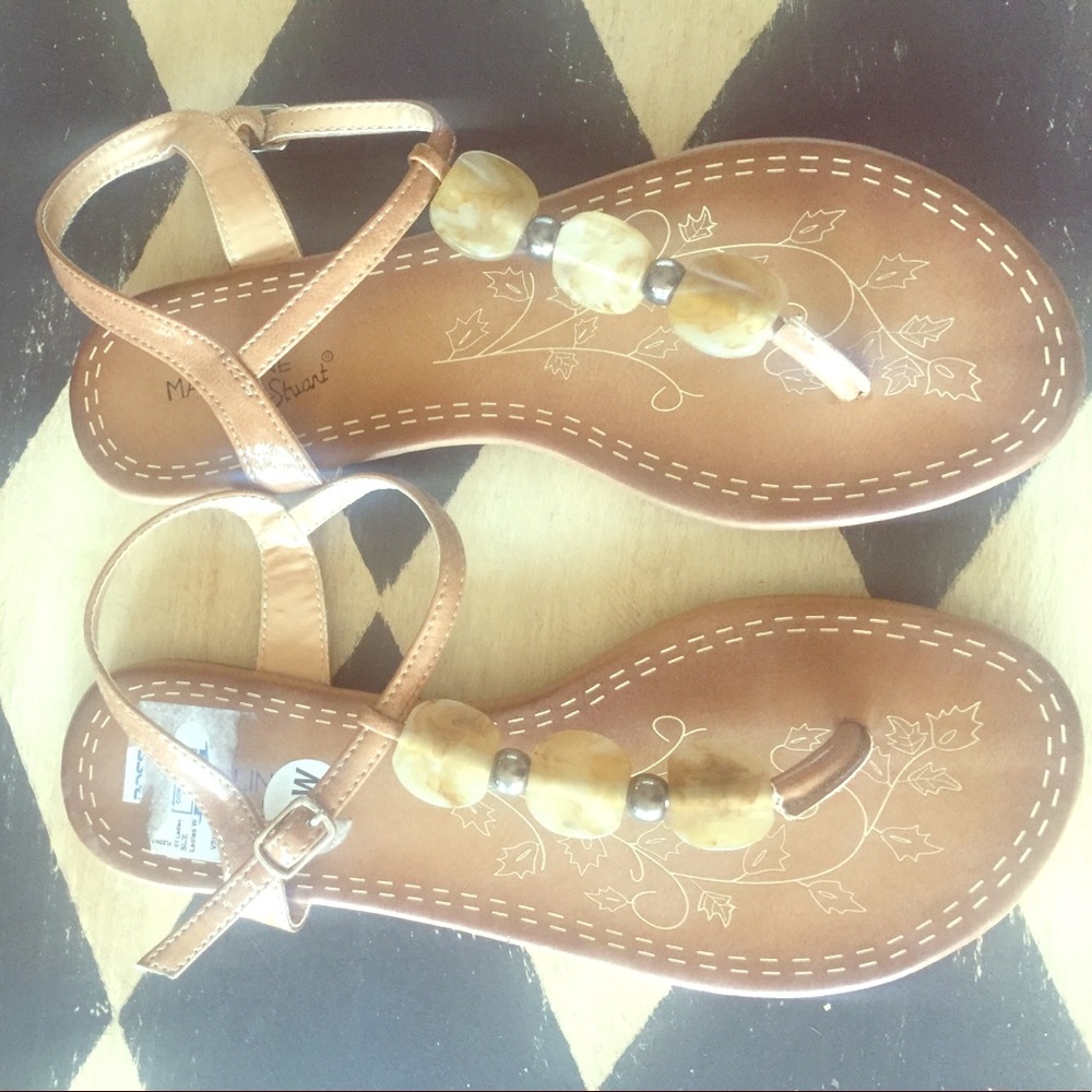 Never worn, tan, stone look sandals.