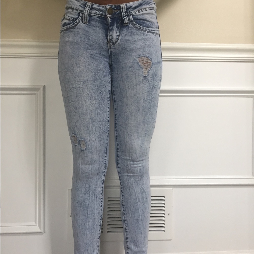Distressed bleach jeans