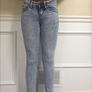 Distressed bleach jeans