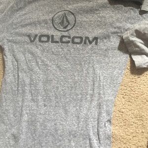 3 Nike shirts and volcom shirt