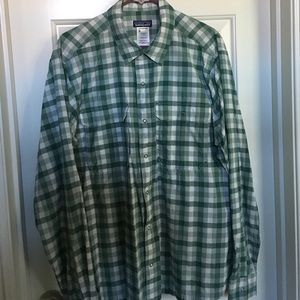 New Condition. Patagonia brand L/S shirt. Size: L