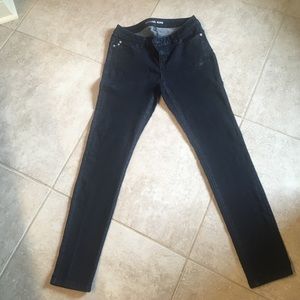 Michael Kors dark wash jeans.
