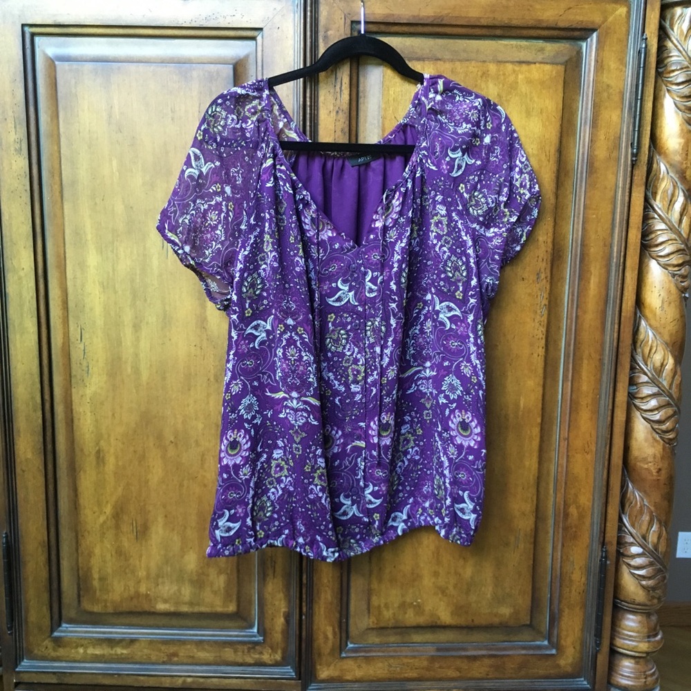 Paisley button down blouse.