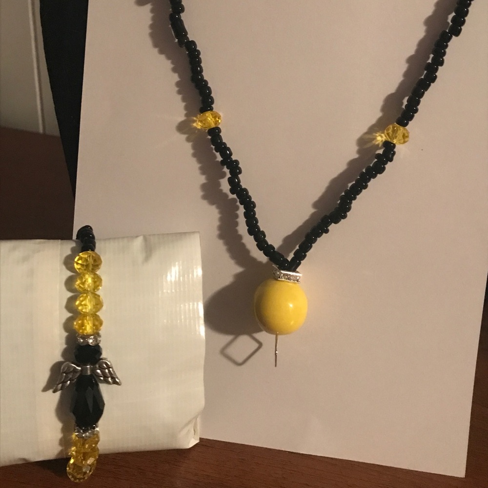 Black and yellow lanyard and matching bracelet