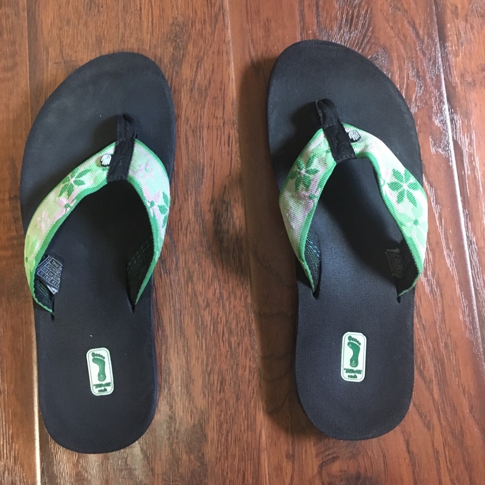 Black, green, and pink Teva sandals, size 11