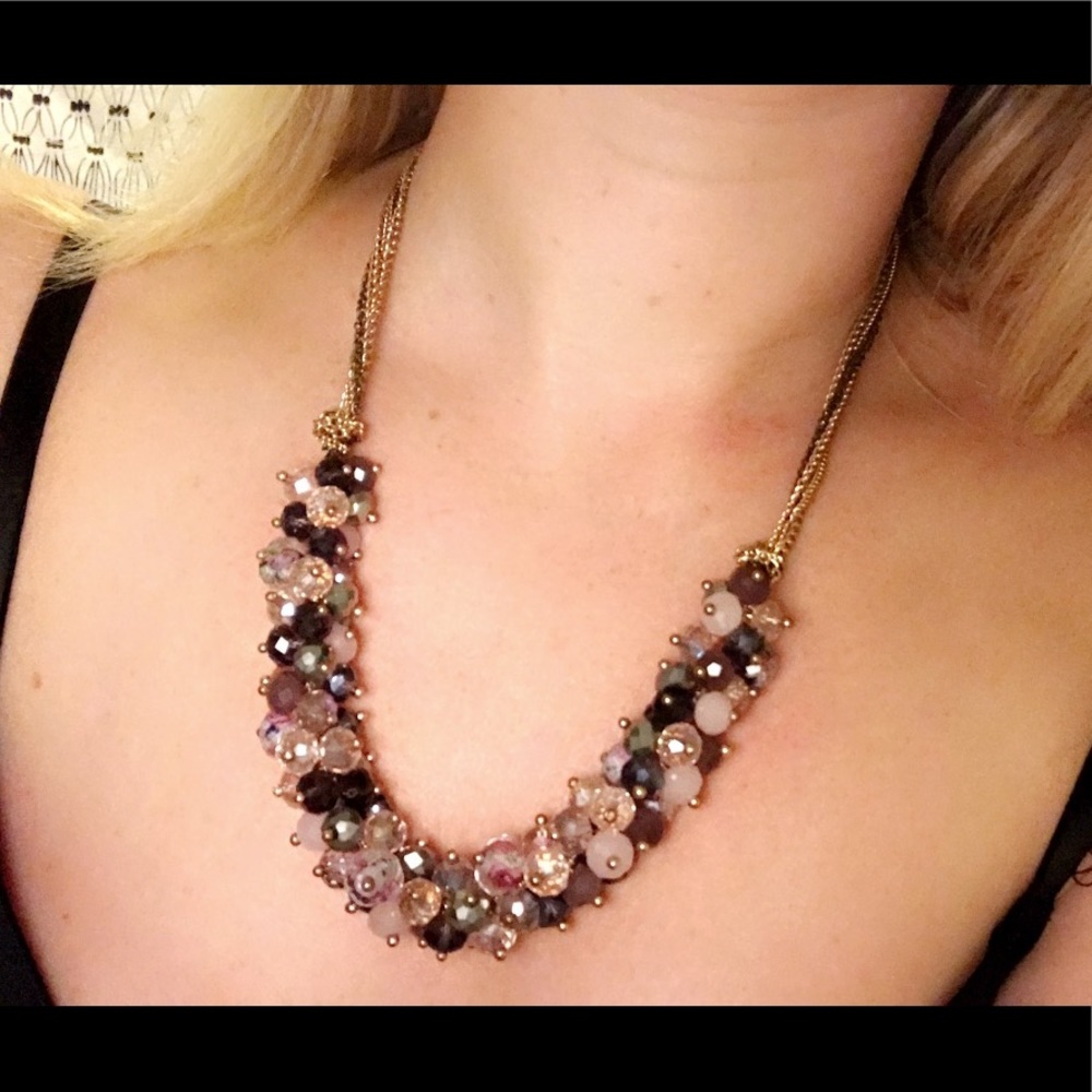 Purple beaded necklace with gold and chrome chain