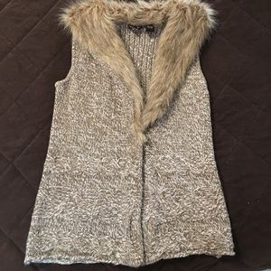 Brown and white vest with fur