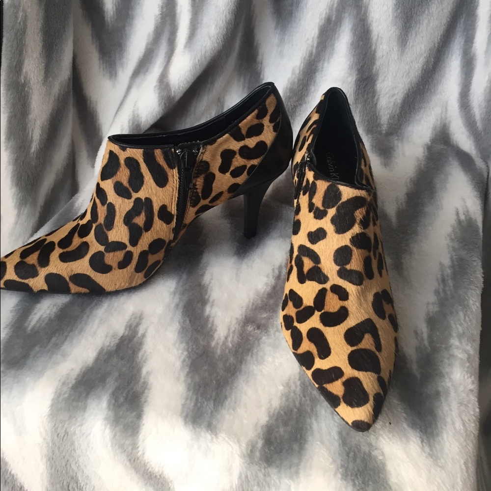 Calvin Klein cheetah pointed toe ankle booties