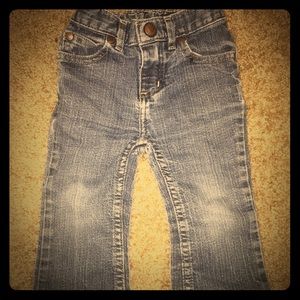 Pair of flare legged jeans with a hint of glitter.