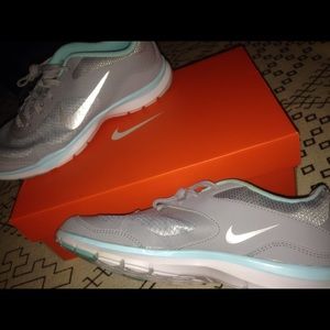 Blue and grey Nike flex TR 5 running shoes