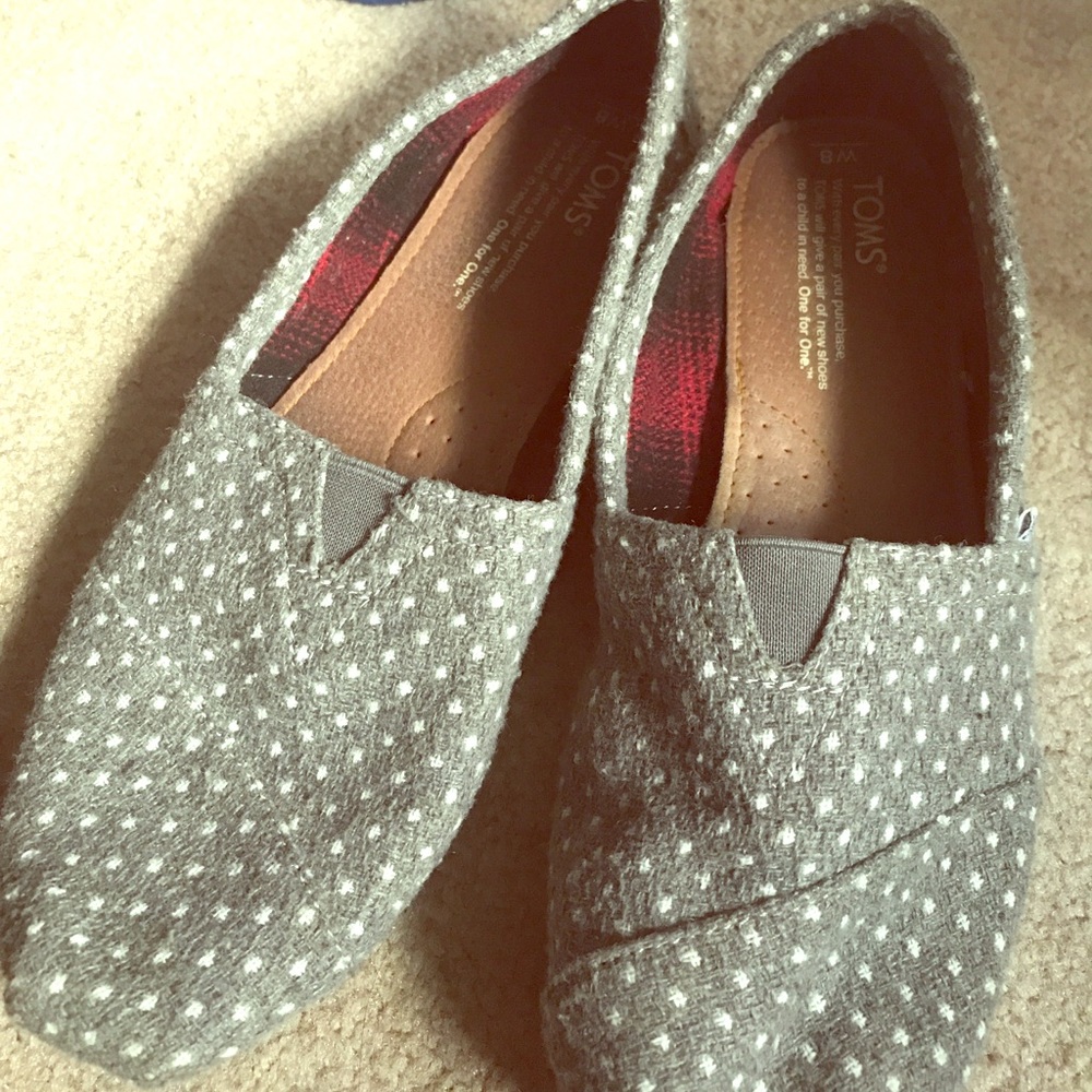 TOMS grey polka dot slip ons
