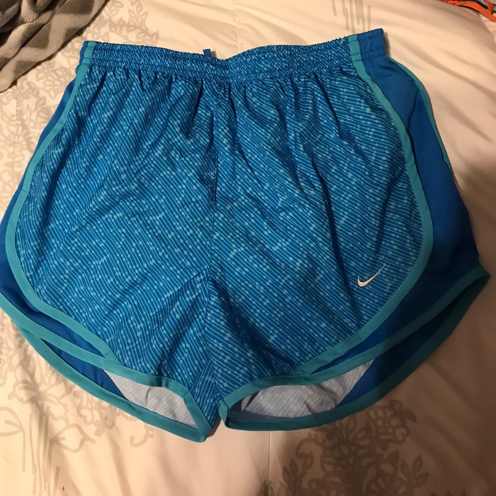 Small blue nike running shorts