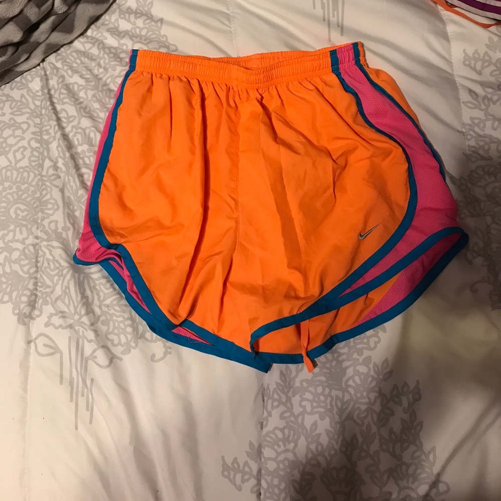 Small orange nike running shorts