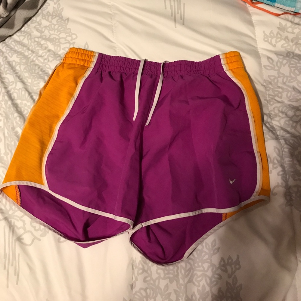 Small fuchsia nike running shorts