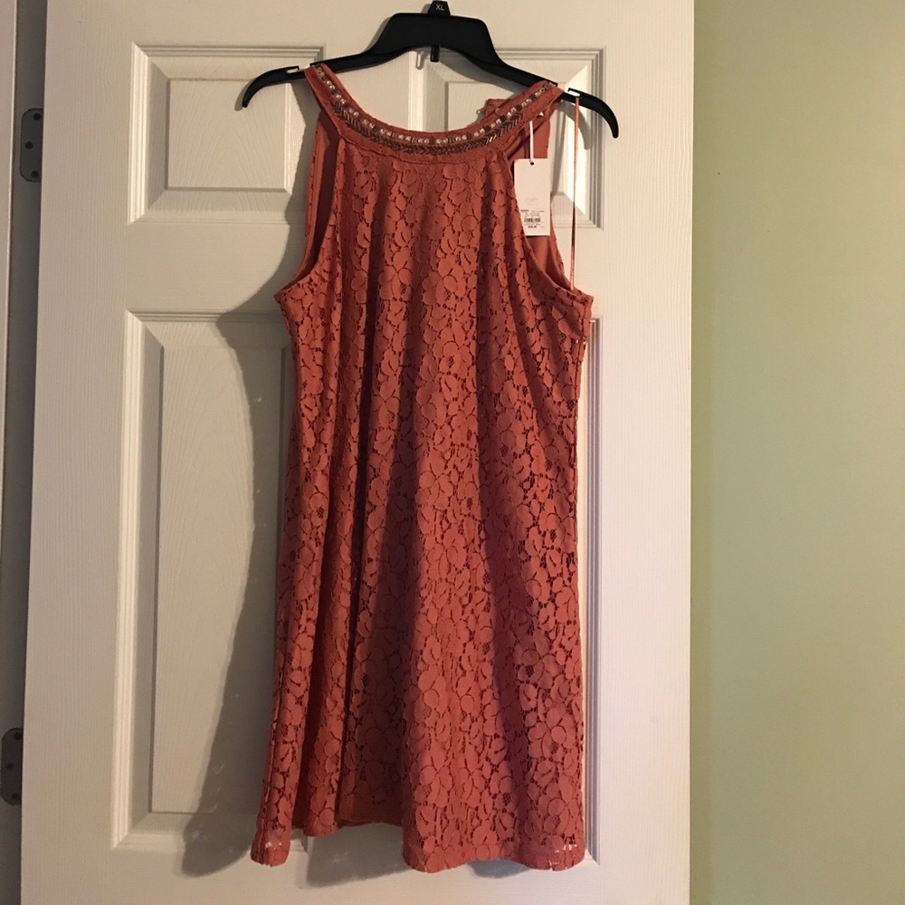 Never worn dress. Still has tags. Size XL.
